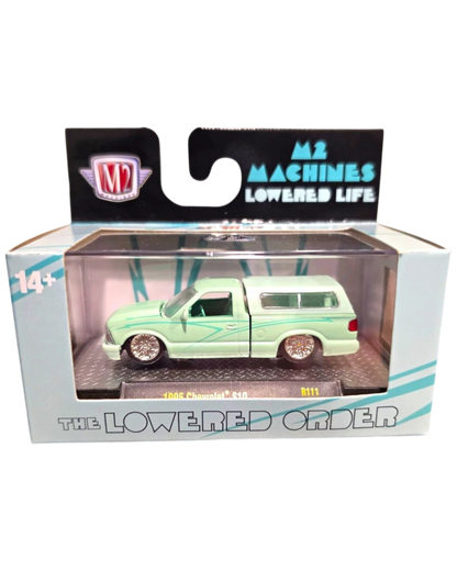 More Than Diecast M2 Machines 1995 Chevrolet S10 green lowrider pickup truck in 1:64 scale with custom wheels