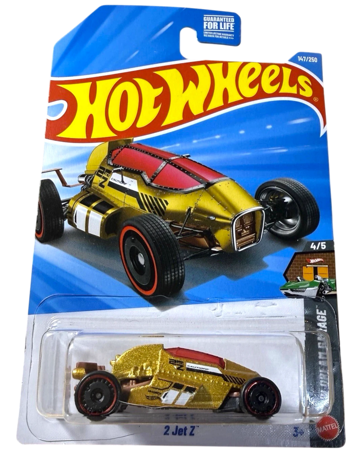 More Than Diecast Hot Wheels Treasure Hunt 2 Jet Z gold 1:64 die-cast car in unopened packaging. Features red accents and black wheels.