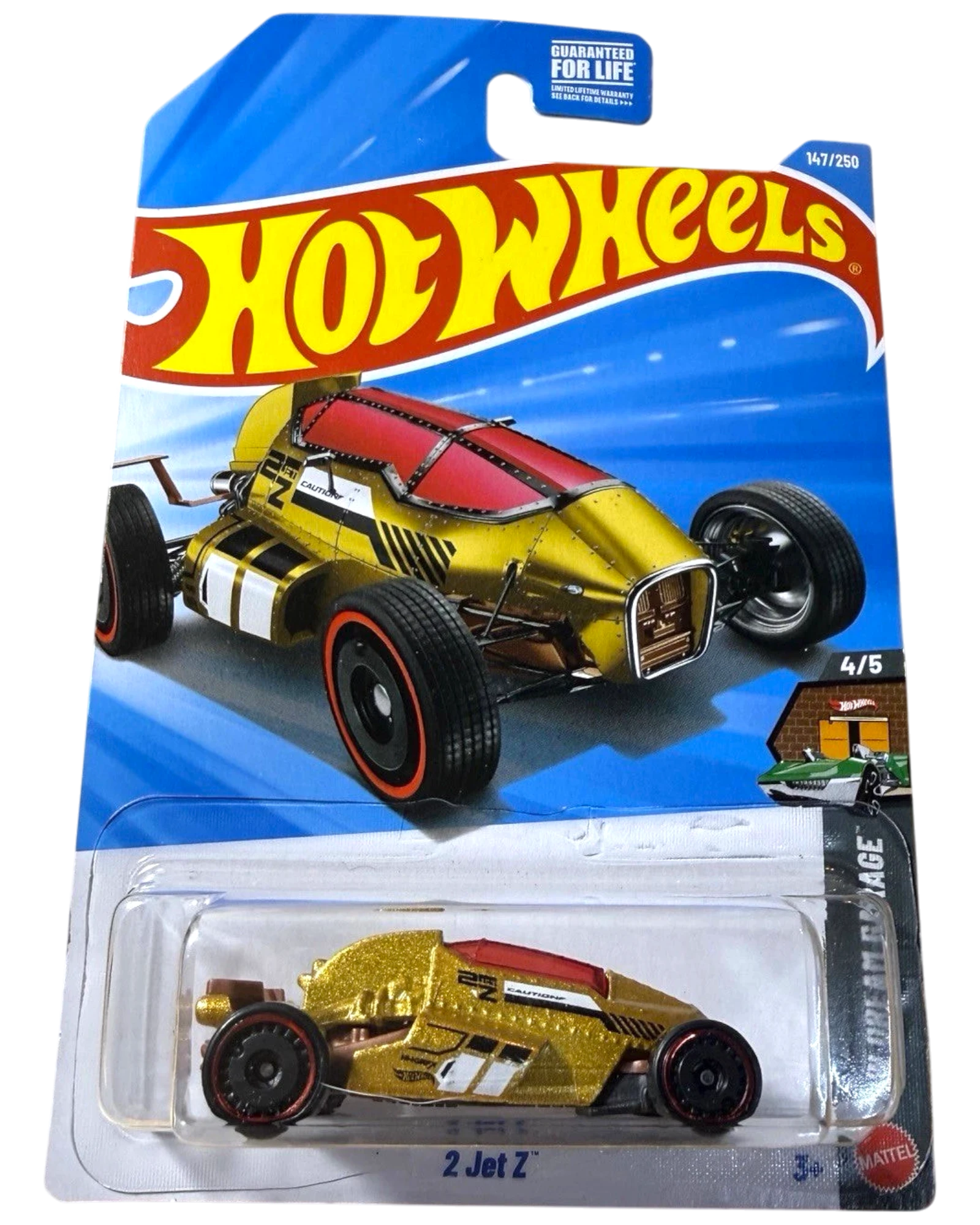 More Than Diecast Hot Wheels Treasure Hunt 2 Jet Z gold 1:64 die-cast car in unopened packaging. Features red accents and black wheels.
