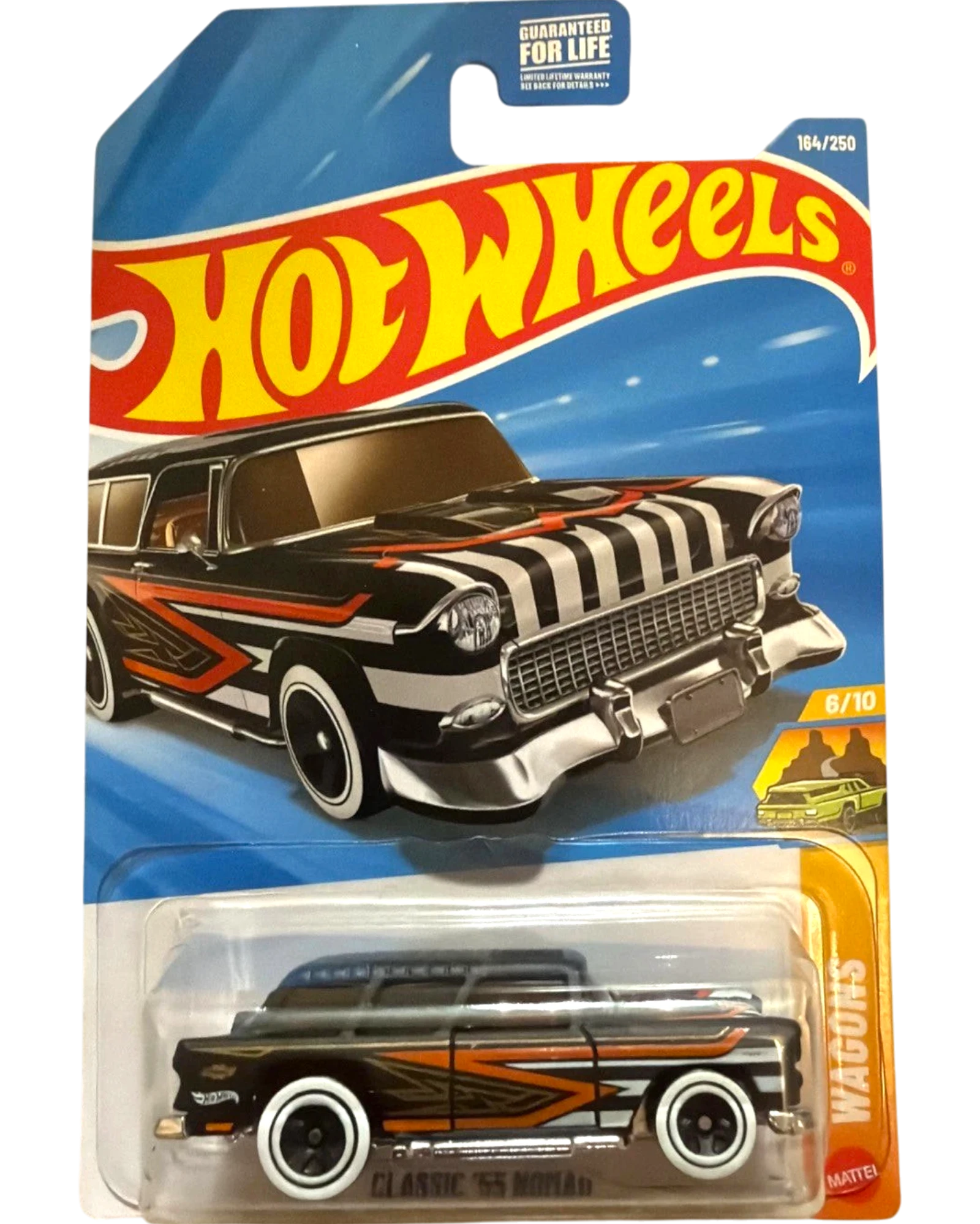 More Than Diecast 2026 Hot Wheels Classic '55 Nomad wagon, black with orange and white racing stripes.