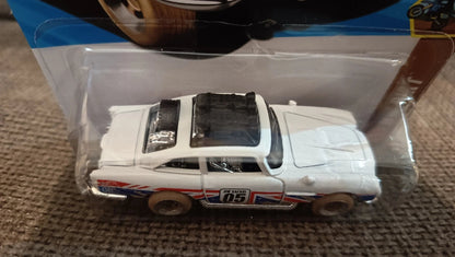 More Than Diecast Hot Wheels Aston Martin DB5 Safari Edition in white with rugged off-road styling and roof rack