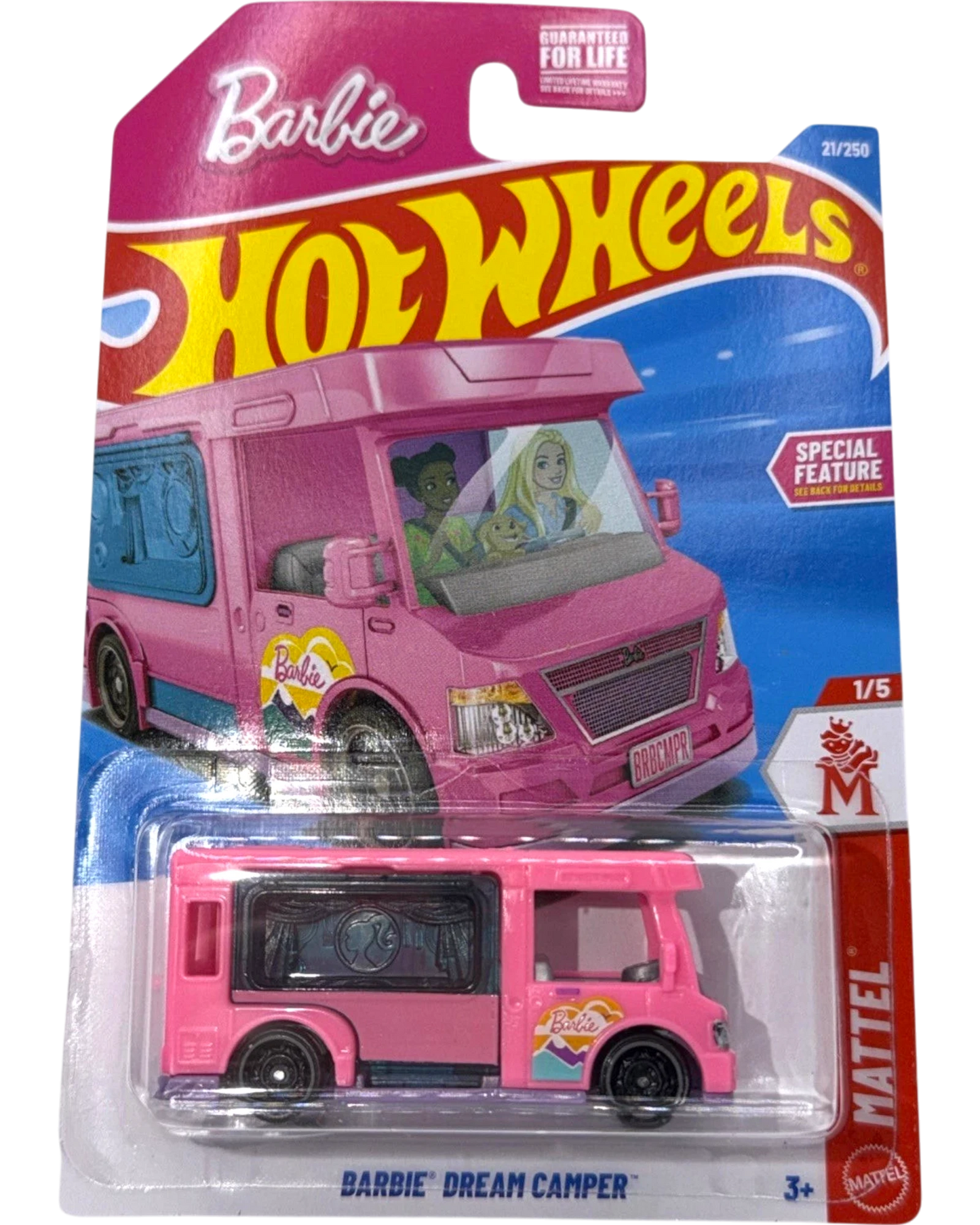 More Than Diecast Hot Wheels Barbie Dream Camper toy vehicle, pink with Barbie graphics and tinted windows.