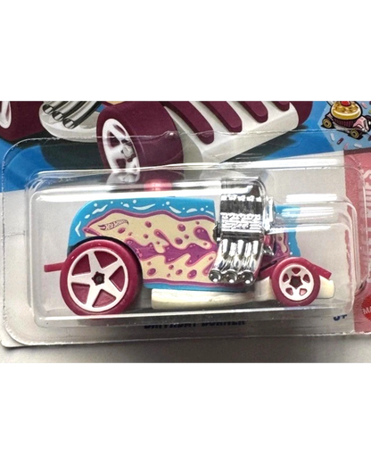 More Than Diecast 2026 Hot Wheels SWEET RIDES Birthday Burner toy car, blue with pink frosting design and chrome engine.