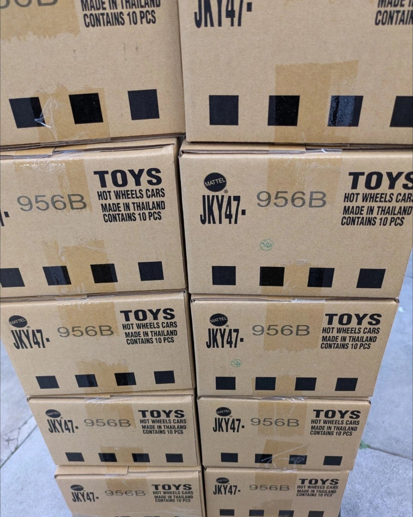 More Than Diecast stacked boxes of Hot Wheels cars, each case contains 10 pcs.