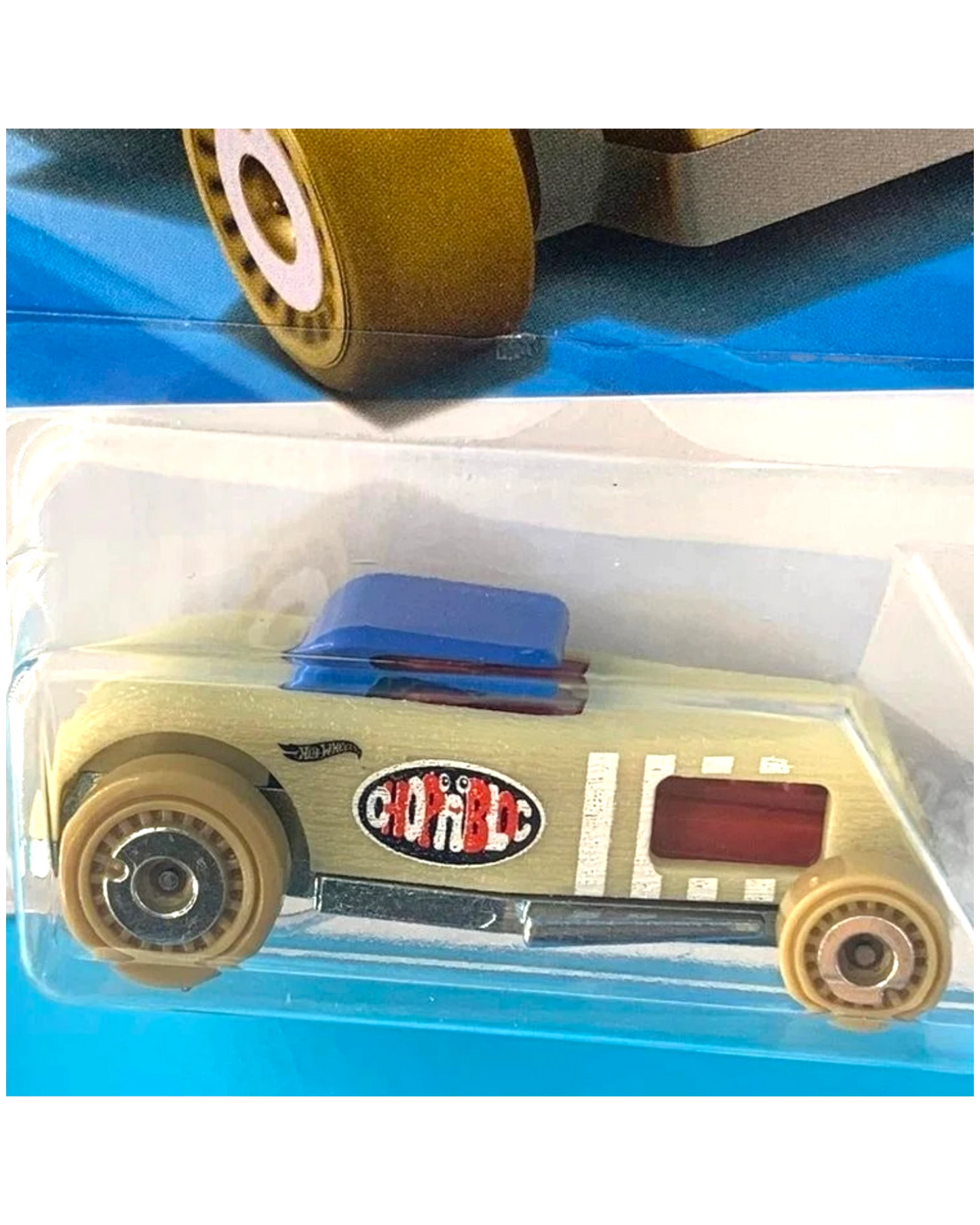 More Than Diecast Hot Wheels Chop 'N Bloc 1:64 scale die-cast car in textured tan with a blue roof and custom graphics.