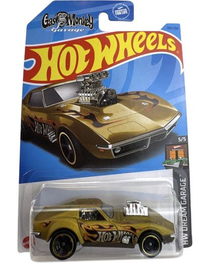 More Than Diecast Hot Wheels 1968 Corvette Gas Monkey Garage die-cast car in gold with flame decals in original packaging