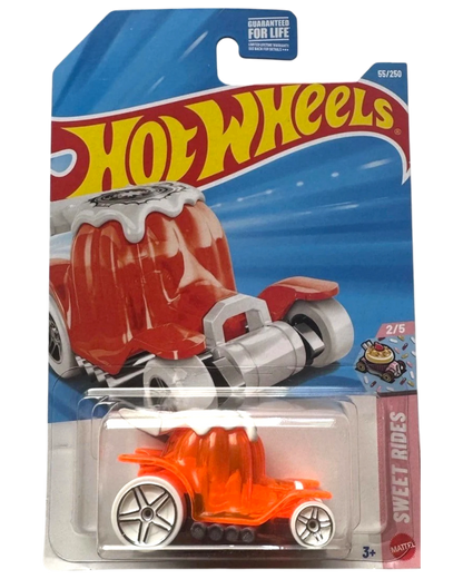 More Than Diecast Hot Wheels Dessert Drifter toy car, orange translucent body with white whipped cream top, silver rims, and large rear wheels.