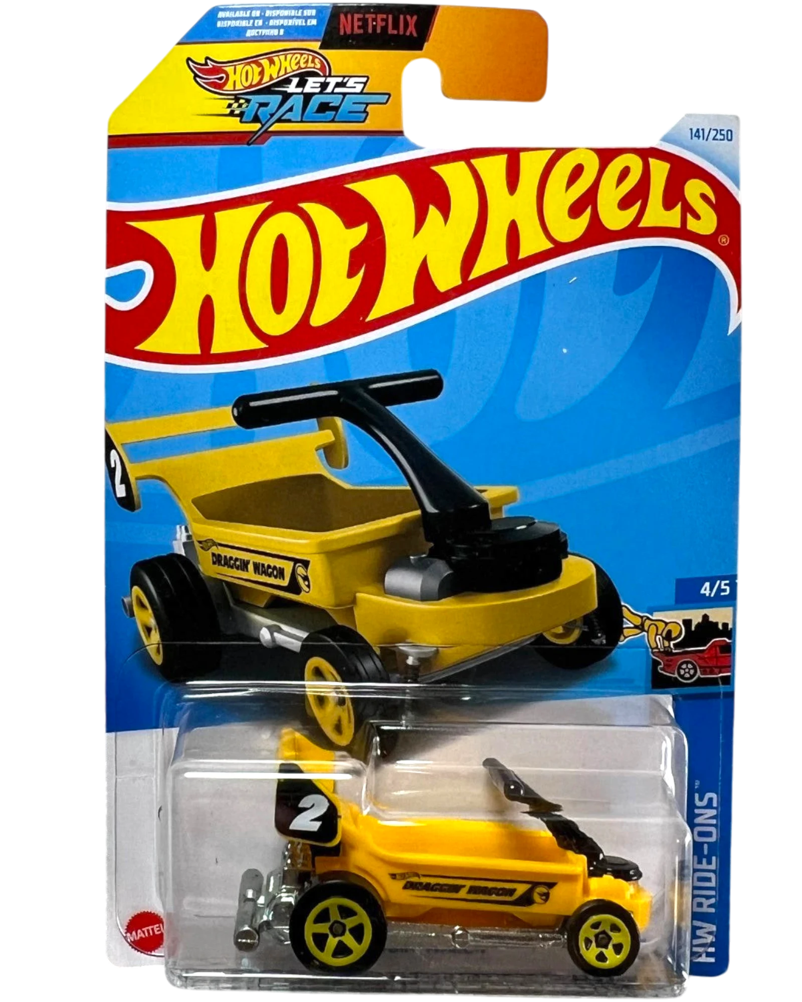 More Than Diecast Hot Wheels Draggin' Wagon Treasure Hunt die-cast car in yellow with flame graphics on blister card