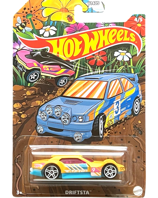 More Than Diecast Hot Wheels Driftsta yellow toy car with pink windows and blue trim, in spring-themed packaging.