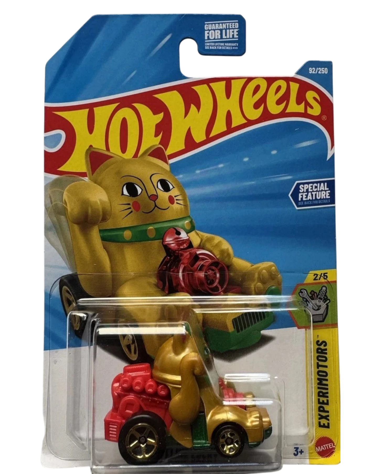 More Than Diecast Hot Wheels EXPERIMOTORS Feline Lucky toy car, gold with red accents, in packaging.