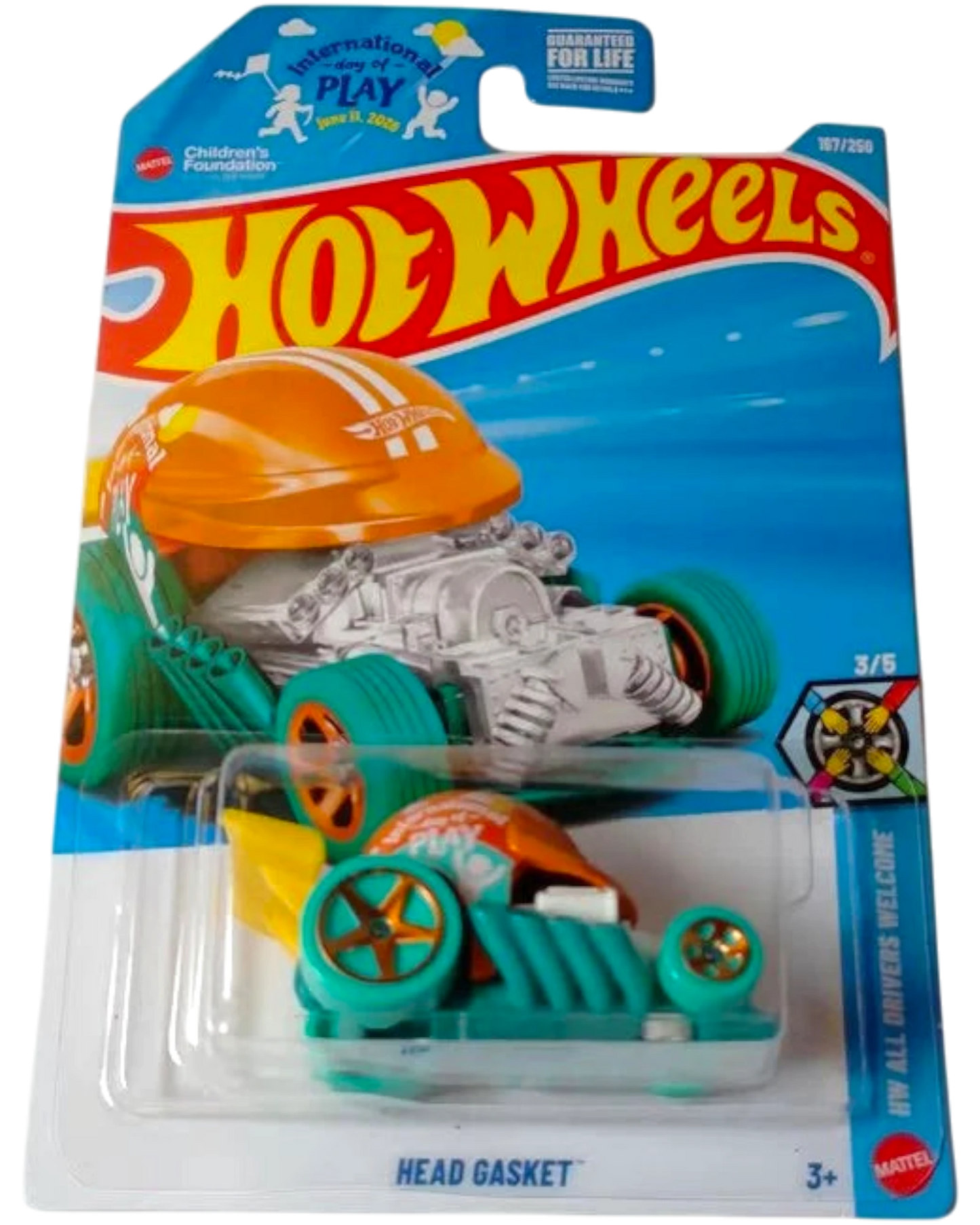 More Than Diecast Hot Wheels HEAD GASKET teal die-cast car with orange helmet and yellow fins.
