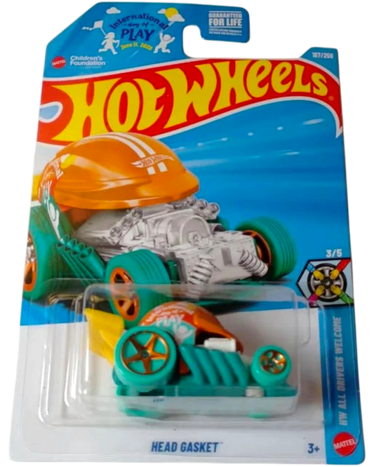 More Than Diecast Hot Wheels HEAD GASKET teal die-cast car with orange helmet and yellow fins.