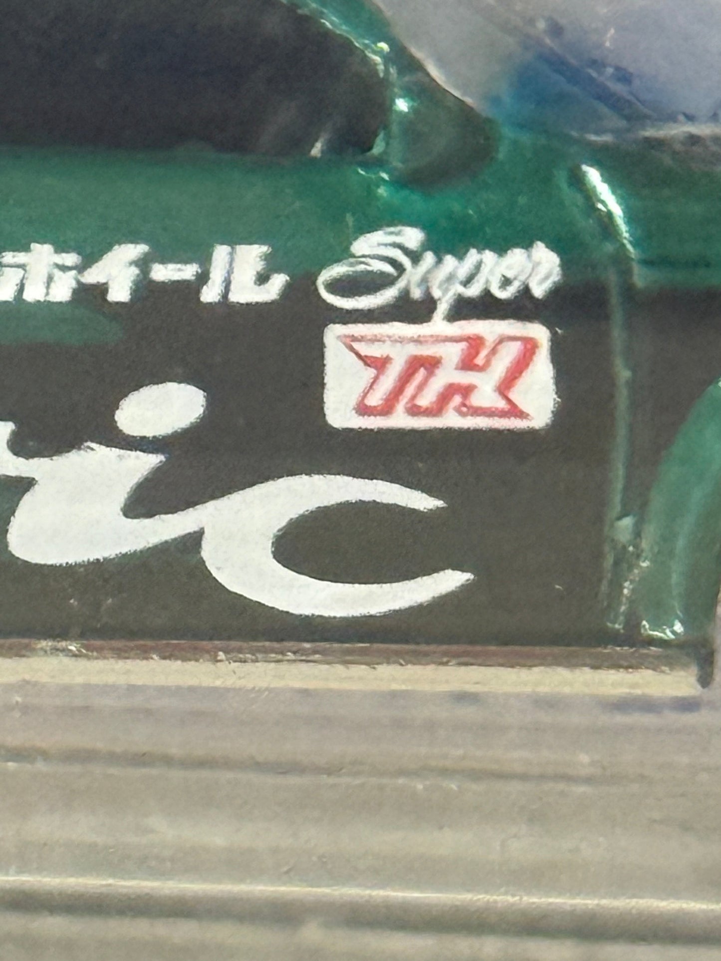 More Than Diecast green and black Honda Civic STH toy car with white lettering and TH logo