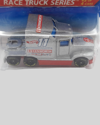More Than Diecast Hot Wheels Ford LTL Kenworth T600 race truck in silver and red with number 11 on blister card