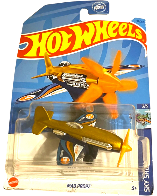 More Than Diecast Hot Wheels Treasure Hunt Mad Propz gold die-cast airplane with orange propeller on blister card