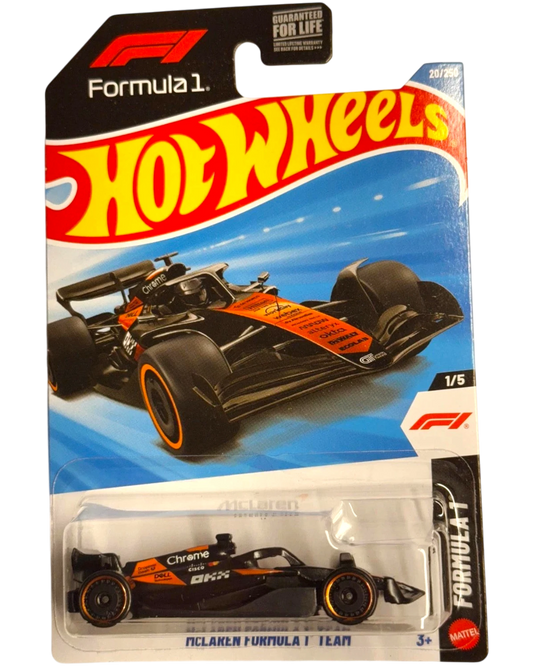 More Than Diecast Hot Wheels 2026 McLaren Formula 1 Team diecast car, black and orange with chrome accents.