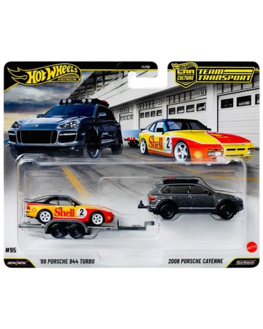 More Than Diecast Hot Wheels Team Transport Shell set featuring a Porsche 944 Turbo, Cayenne, and rally trailer.