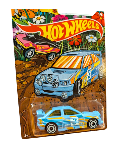 More Than Diecast Hot Wheels HW Spring Series blue rally car with yellow accents and number 3 on card.