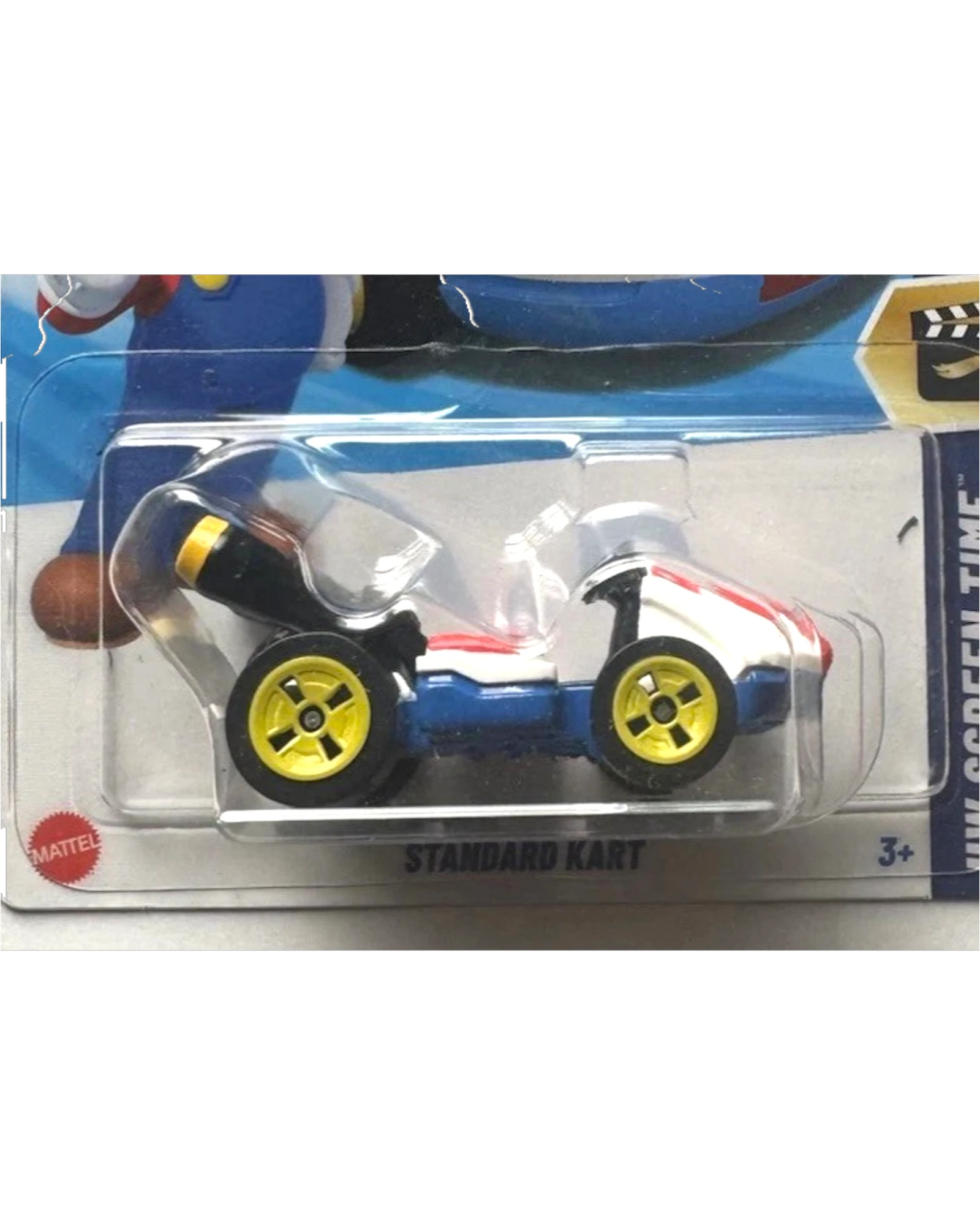 More Than Diecast Hot Wheels Standard Kart toy car, white, red, and blue with yellow wheels.