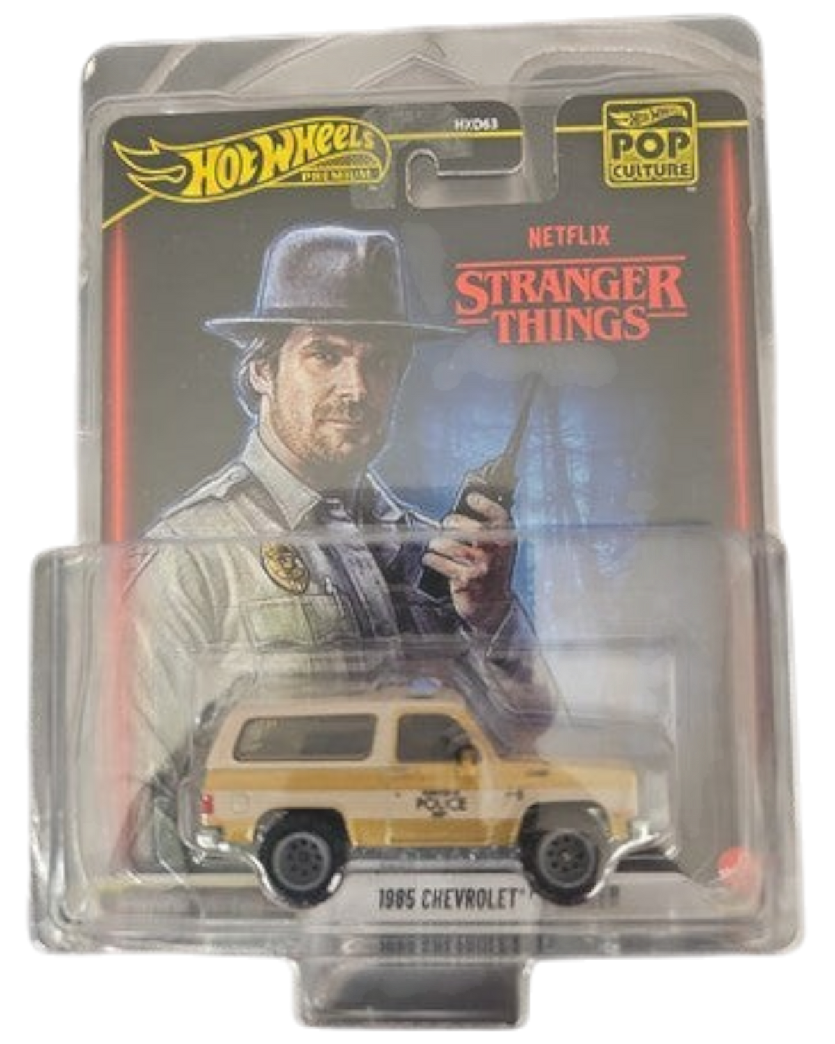 More Than Diecast Hot Wheels Stranger Things 1985 Chevrolet K5 Blazer die-cast SUV in blister pack with Hopper art