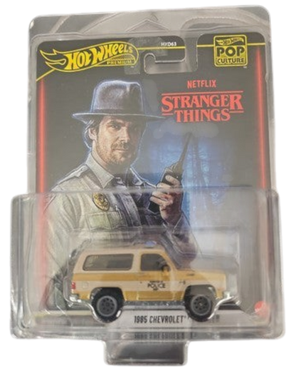More Than Diecast Hot Wheels Stranger Things 1985 Chevrolet K5 Blazer die-cast SUV in blister pack with Hopper art