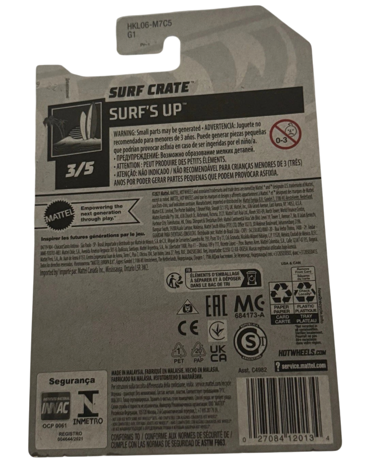 Back of More Than Diecast Hot Wheels Surf Crate Treasure Hunt 2022 packaging showing safety information and branding