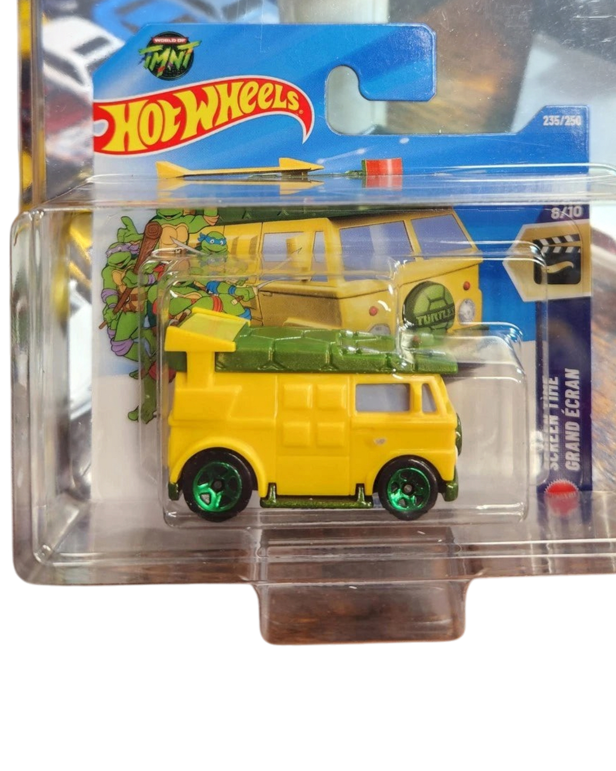 More Than Diecast Hot Wheels TMNT Party Wagon 1:64 scale die-cast vehicle in yellow and green on a short card