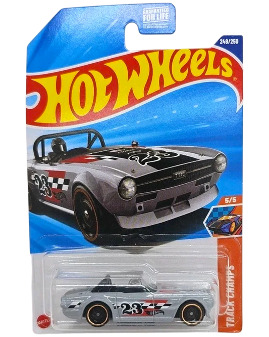 More Than Diecast Hot Wheels Triumph TR6 Treasure Hunt die-cast car in grey with racing decals on blister card