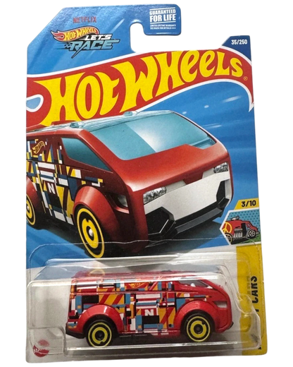 More Than Diecast 2025 Hot Wheels HW ART CARS The Vanster diecast toy car, red with geometric pattern and yellow wheels.