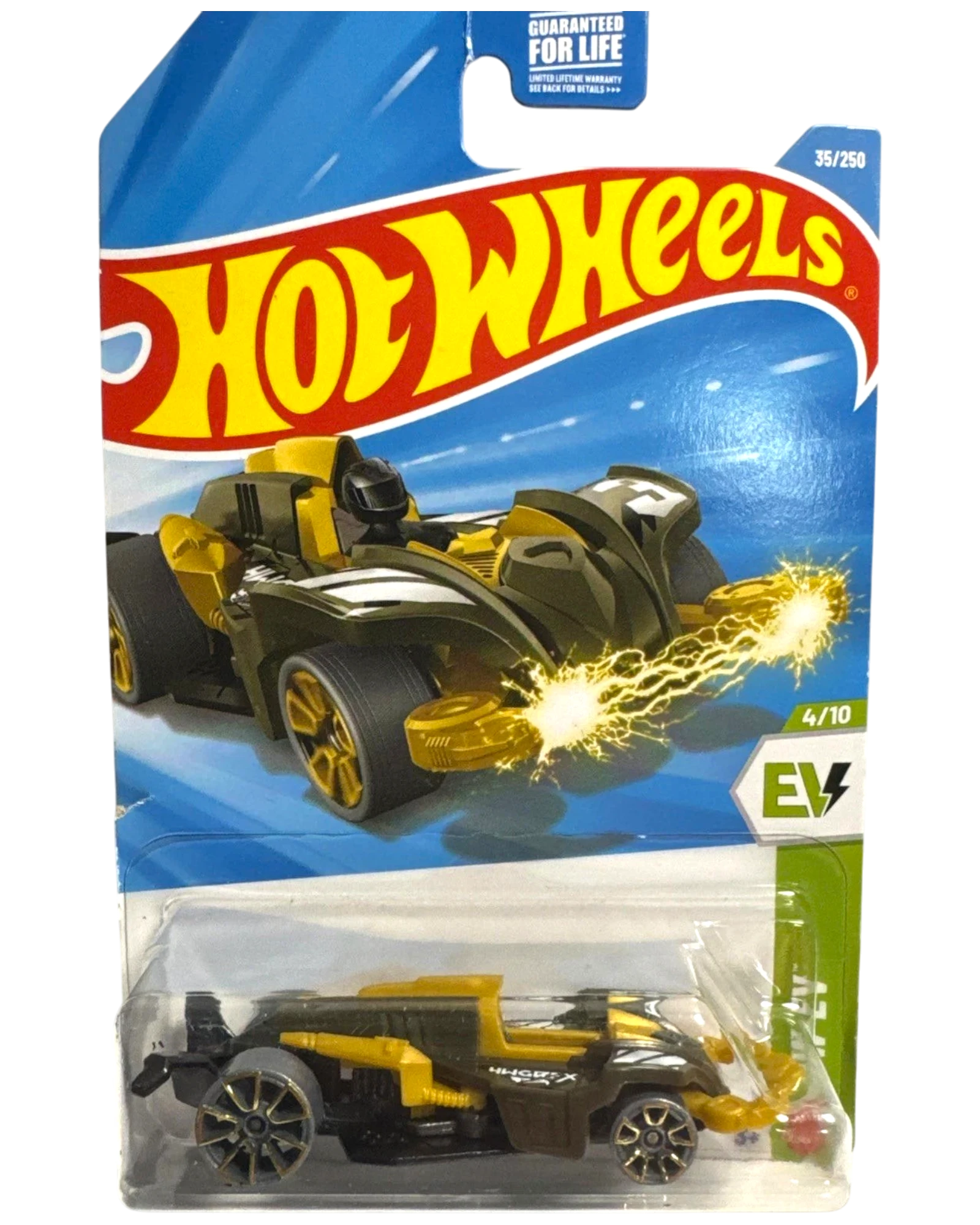 More Than Diecast Hot Wheels Wattzup 1:64 scale die-cast car in green and gold with electric detailing. Unopened in packaging.