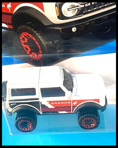 More Than Diecast Hot Wheels 2021 Ford Bronco in white with red and black side graphics in original blister packaging