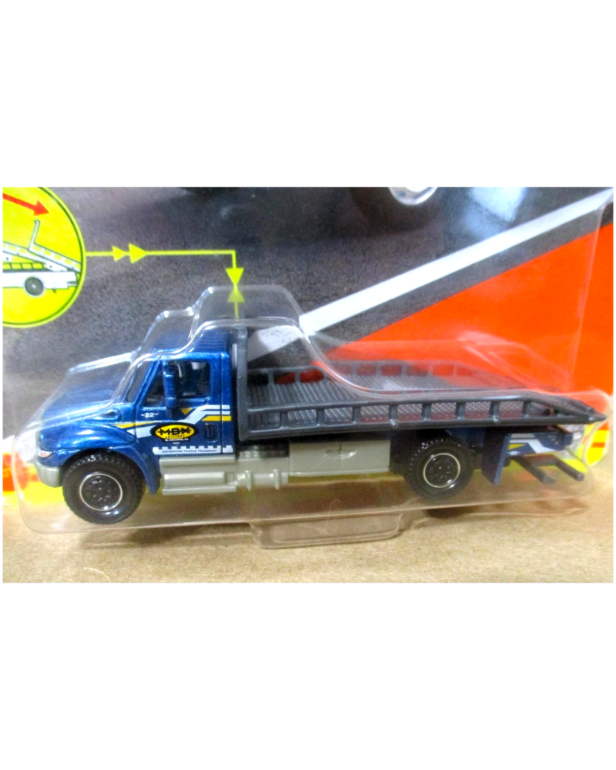 More Than Diecast Matchbox International Durastar 4400 flatbed tow truck in blue 1:87 scale die-cast model