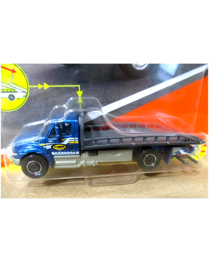More Than Diecast Matchbox International Durastar 4400 flatbed tow truck in blue 1:87 scale die-cast model