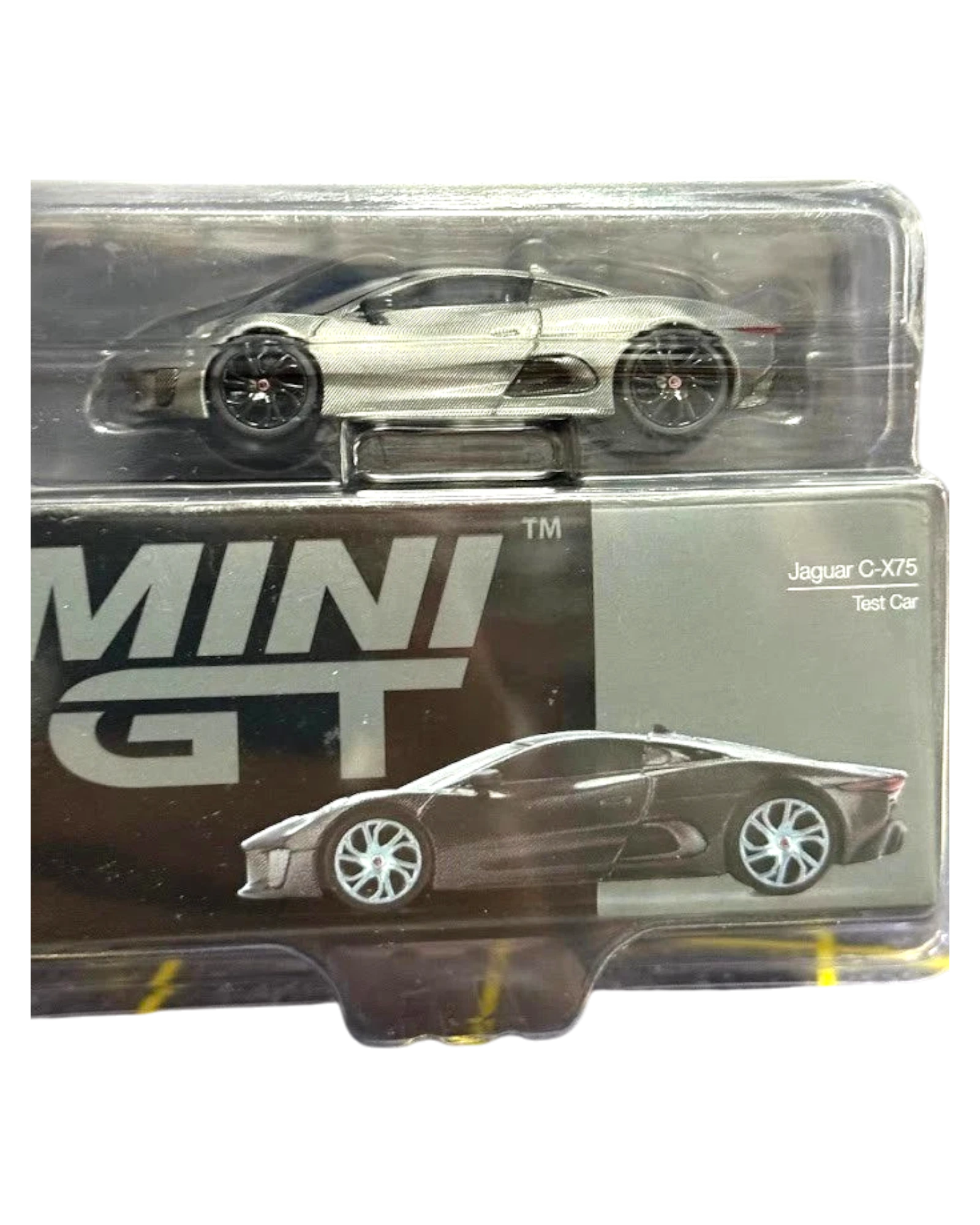 More Than Diecast Mini GT Jaguar C-X75 Test Car 1/64 scale diecast model in raw black finish.