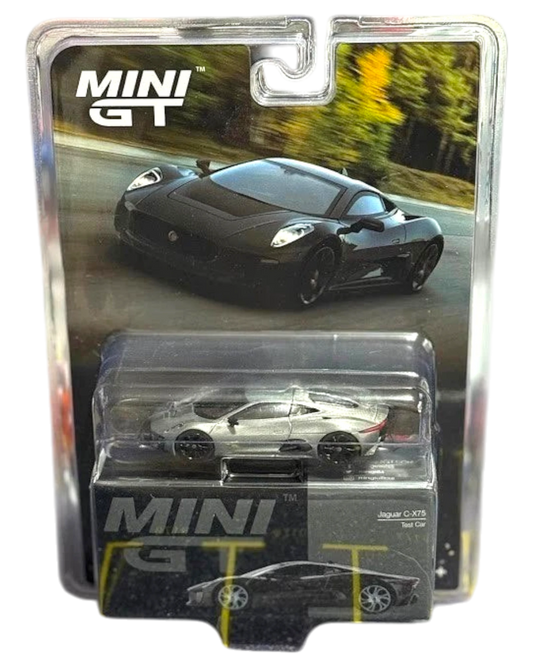 More Than Diecast Mini GT Jaguar C-X75 Test Car 1/64 scale diecast model in black packaging.