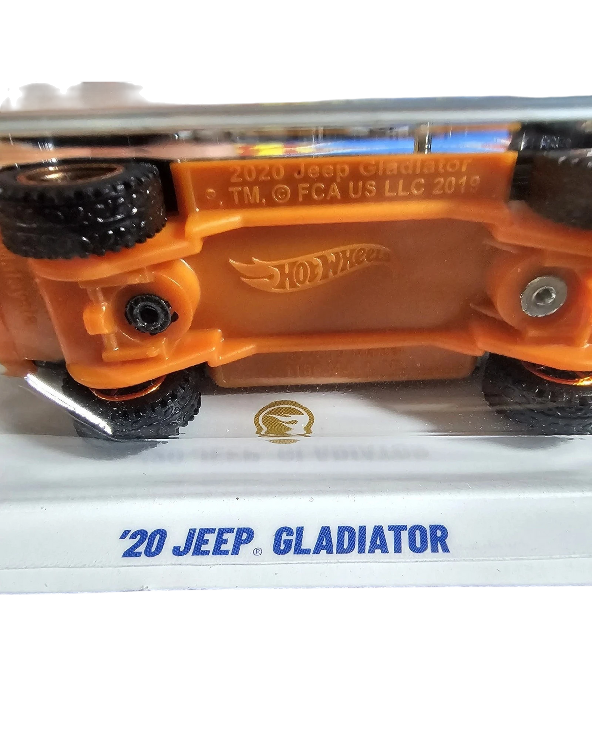 More Than Diecast 2025 Hot Wheels Super Treasure Hunt 20 Jeep Gladiator chassis view showing orange base and wheels