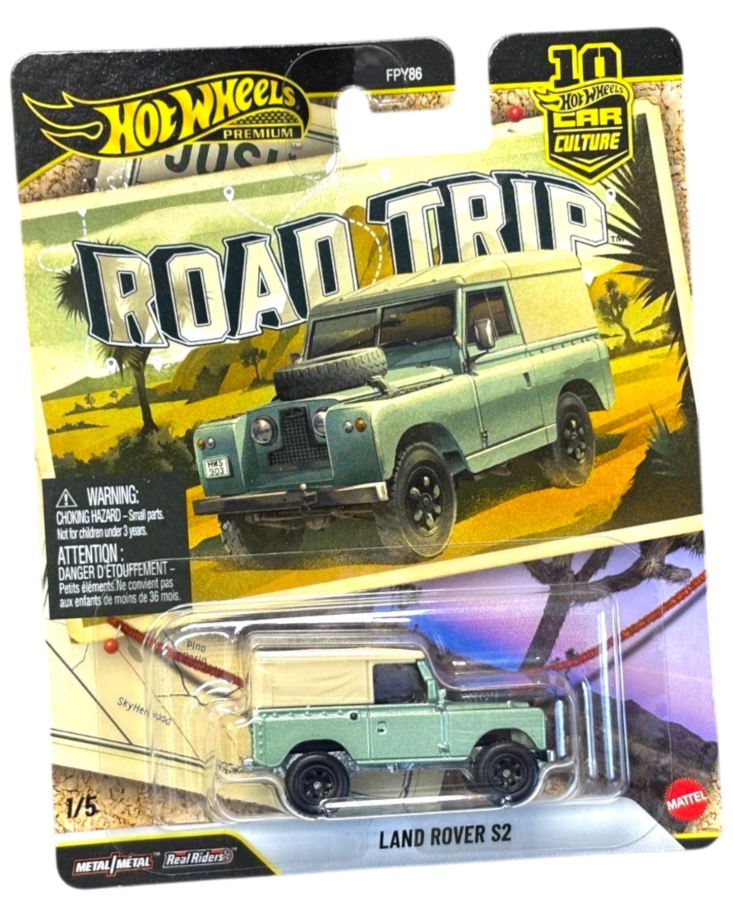 More Than Diecast Hot Wheels Land Rover Series II die-cast car in light green with a tan roof in original packaging.