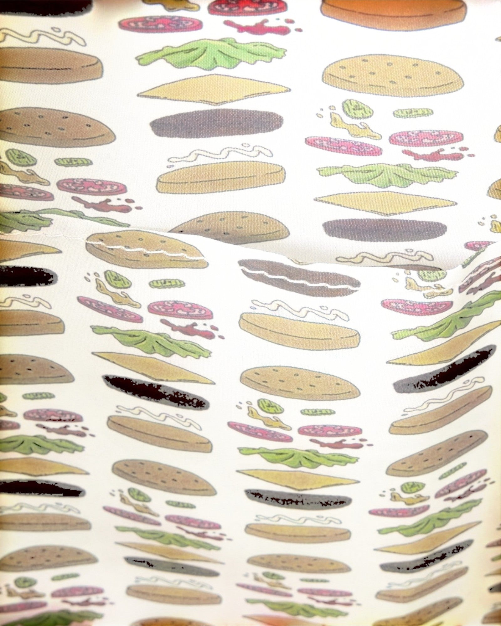 Loungefly Bob's Burgers restaurant mini-backpack with a pattern of deconstructed burgers and toppings on a white background.
