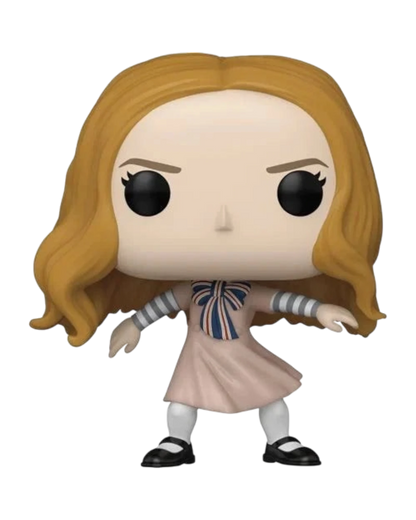 More Than Diecast Funko Pop! M3GAN dancing figure wearing a pink dress and striped bow, isolated on black background.