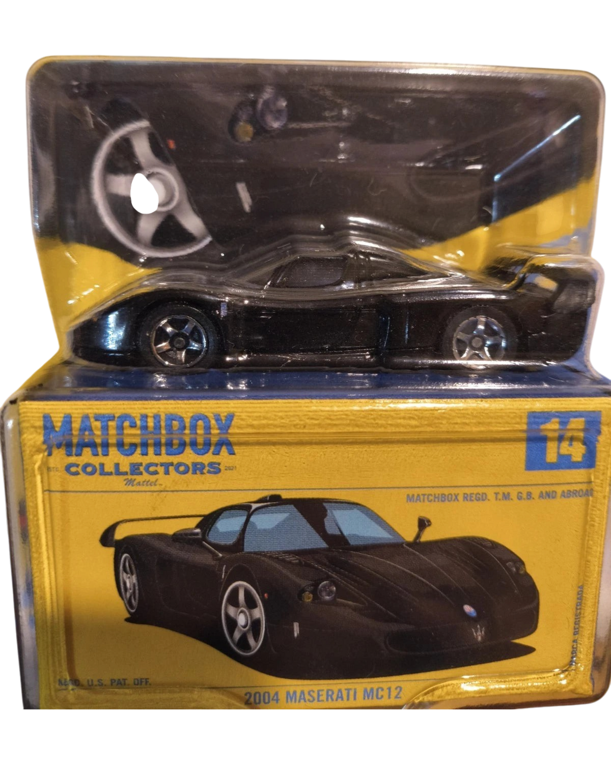 More Than Diecast 2004 Maserati MC12 black diecast car in Matchbox Collectors packaging with True Grip tires