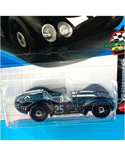 More Than Diecast Hot Wheels 2026 Maserati Tipo 61 Birdcage in black with white racing stripes in blister packaging.