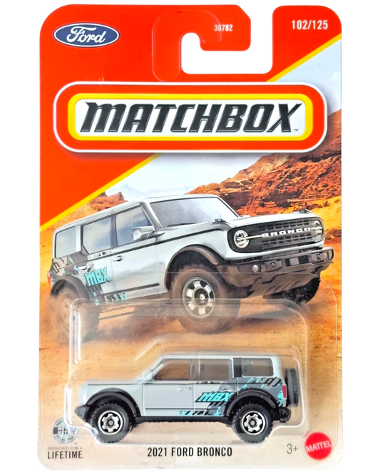 More Than Diecast Matchbox 2026 21 Ford Bronco die-cast SUV in silver with off-road graphics on blister card packaging