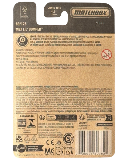 More Than Diecast Matchbox Lil' Dumper 1:64 scale die-cast dump truck packaging back view with safety information