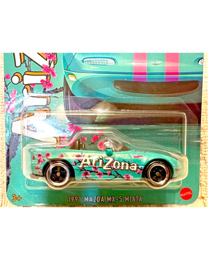 More Than Diecast Hot Wheels 1991 Mazda MX-5 Miata featuring teal Arizona Iced Tea livery with cherry blossom art