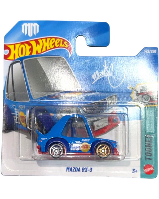 More Than Diecast blue Mazda RX-3 Tooned Hot Wheels toy car with gold rims and a spoiler.