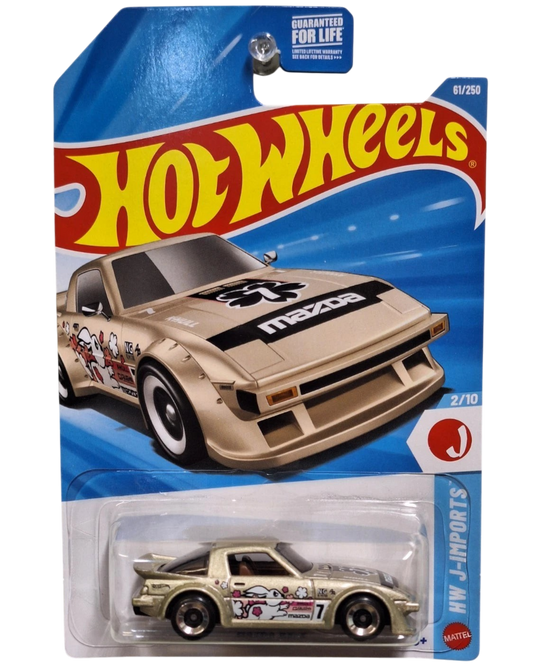 More Than Diecast Hot Wheels 2026 Mazda RX-7 die-cast car in gold with J-Imports graphics on blister card packaging.