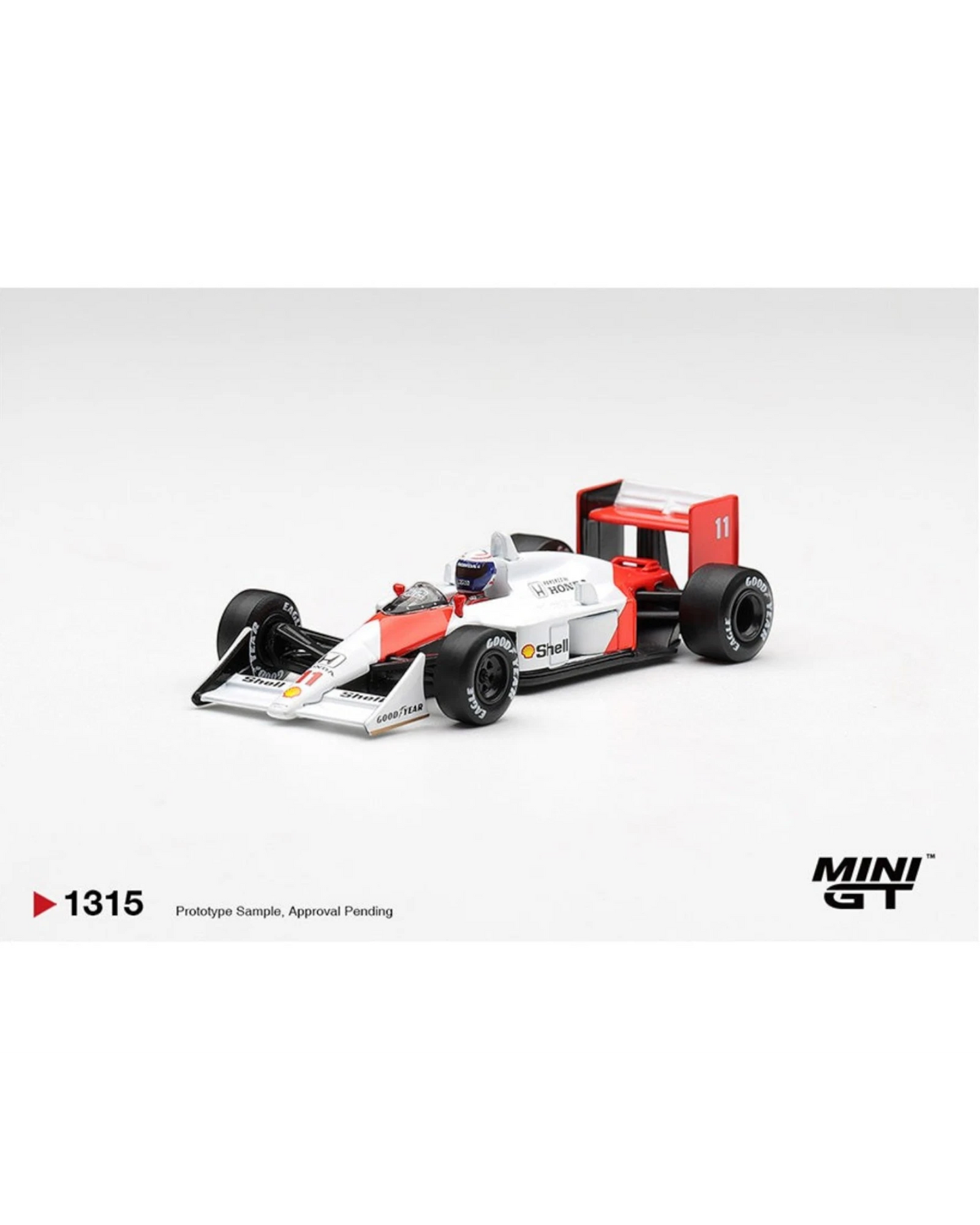 More Than Diecast 1:64 scale model of McLaren MP4/4 #11 Alain Prost 1988 Canadian Grand Prix car, white with red accents.
