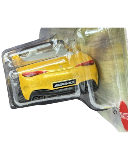 More Than Diecast yellow Mercedes-AMG SL 63 1:64 scale die-cast car in original blister packaging, rear view