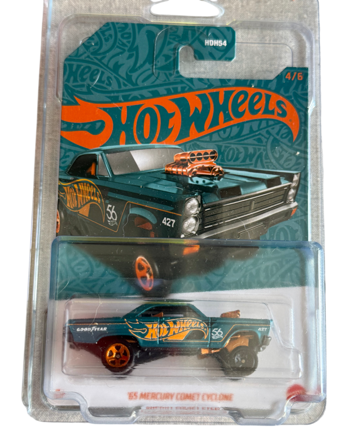 More Than Diecast Hot Wheels 65 Mercury Comet Cyclone 56th Anniversary edition in teal with orange wheels on card