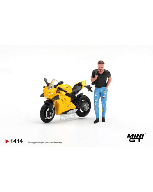 More Than Diecast 1:64 scale yellow Ducati Panigale V4 S motorcycle model with a standing male figure